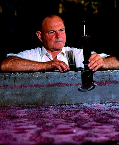 Mick Morris checking the specific gravity of a tank   of fermenting Shiraz    Morris Wines Rutherglen   Victoria Australia