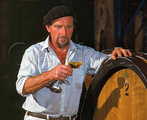 Graham Wiltshire former winemaker of Heemskerk tasting wine from barrel   Tasmania Australia