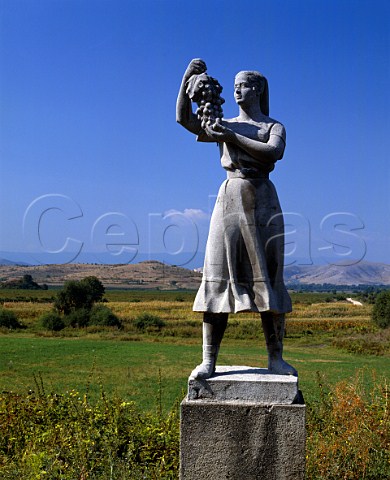 Statue of woman with bunch of grapes at entrance to the Pulden winery in Perushtitsa near Plovdiv  Bulgaria  West Thracian Valley