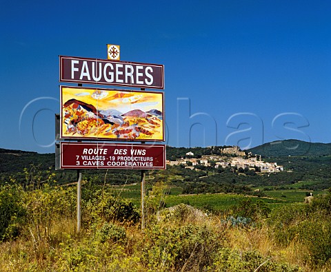 Faugres sign with village of Roquessels beyond   Hrault France  AC Faugres