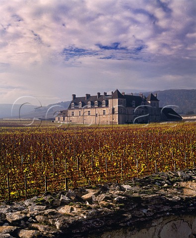Chteau du Clos de Vougeot and its autumnal vineyard with the clos wall in foreground Vougeot Cte dOr France Cte de Nuits Grand Cru