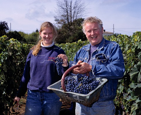 Tony Laithwaite with basket of harvested Merlot   grapes in vineyard of Chteau la   ClarireLaithwaite SteColombe Gironde France     Ctes de Castillon  Bordeaux