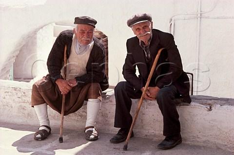 2 elderly men talking in the village   Ios Cyclades Greece
