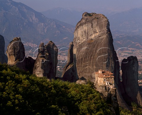 Roussanou Monastery amidst the rock pinnacles of the Meteora with the Plain of Thessaly beyond Greece