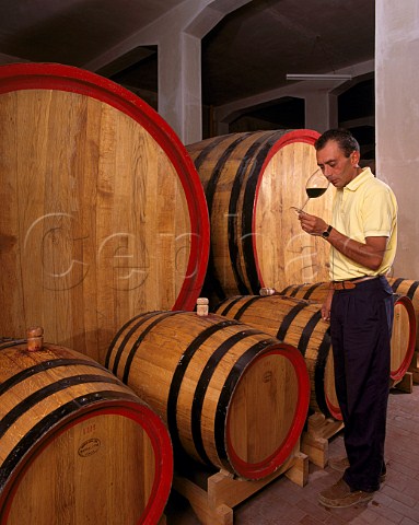 Donato dAngelo tastes his wine from barrel Rionero in Vulture Basilicata Italy