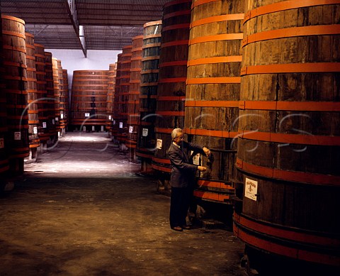 Taking sample of Marsala Superiore Dolce from cask in the cellars of Carlo Pellegrino Marsala Sicily