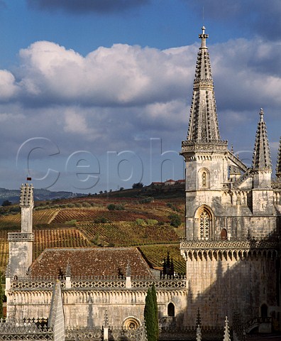 The Monastery of Santa Maria with vineyards in distance Better known as the Battle Abbey of Batalha it built between 1388 and 1434 by Joao Aviz King of Portugal to commemorate the Battle of Aljubarrota at which he secured the monarchy Batalha Estremadura Portugal