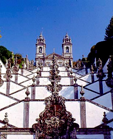 The church of Bom Jesus do Monte situated at the top of its vast ornamental staircase of white plaster and granite Cut into the side of a densely wooded hill high above the city of Braga it was created at the beginning of the 18th century by Bragas archbishop and is now a place of pilgrimage  Portugal