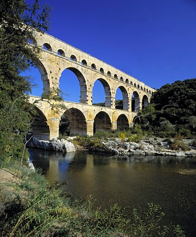 Pont du Gard a Roman Aqueduct 45m high and 275m   long built to carry the Nmes water supply across   the Gardon River near Remoulins   Gard France