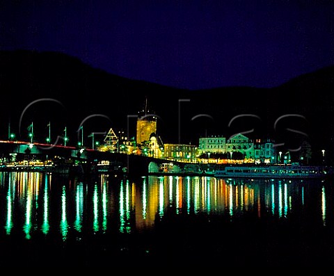 Bernkastel town at night with street lights   reflecting in the Mosel River Germany
