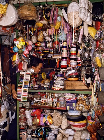 Woman in haberdashery shop on Pottinger street  Central district  Hong Kong