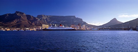 Cape Town docks with QE2 moored  Table Mountain is   beyond  South Africa