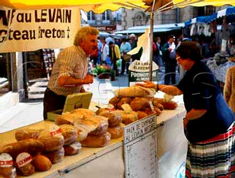 Bread stall in market at Auray Brittany France                    