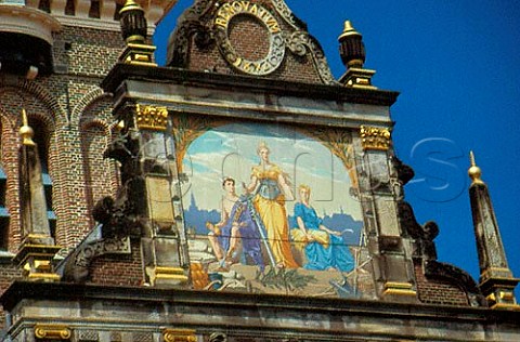 Detail on Waag or Weighhouse with   mural showing cheeses in its show of   Bounty Alkmaar Holland