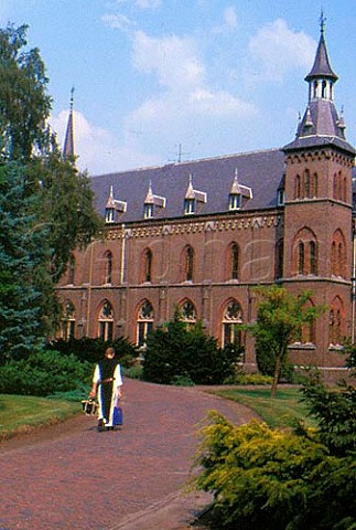 Koningshoeven near Tilburg   Netherlands Abbey of Our Lady a monk   returning from town home of La Trappe   trappist beer