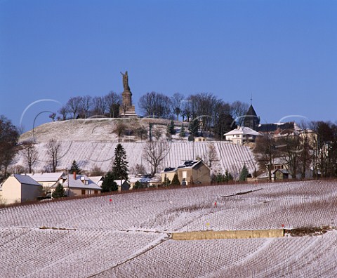 ChatillonsurMarne and its snow covered vineyards  in the Marne valley overlooked by the huge statue of  Pope Urbain II   Marne France     Champagne  Marne la Valle