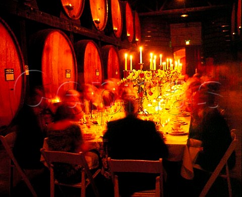 Dinner party in barrel room of Merryvale Winery St Helena Napa Valley California