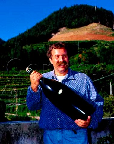 Mario Pojer of Pojer  Sandri at their cellars inFaedo Here they have vines up to altitudes of around750 metres including the Palai vineyard  of which asection recently prepared and planted withMullerThurgau can be seen on the hillside beyondTrentino Italy