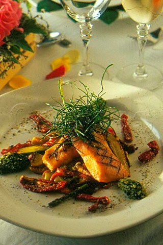 Grilled salmon on a bed of grilled   mediterranean vegetables with pistou