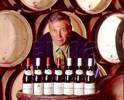 Winemaker Philippe Prost with seven of his   Grand Cru Burgundies in the cellars of   Bouchard Pre et Fils Beaune   Cte dOr France
