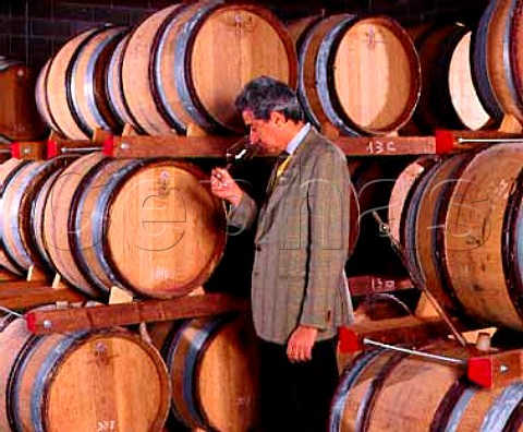 Carlo de Corato tasting his Il Falcone from barrique   in the cellars of Rivera   Andria Puglia Italy   Castel del Monte