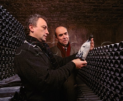 Henri Roch and Aubert de Villaine in the bottle ageing cellar of Domaine de la RomaneConti  VosneRomane Cte dOr France