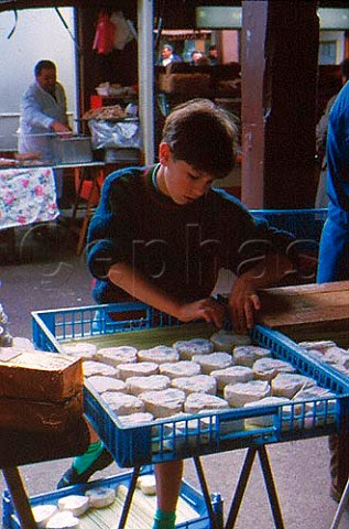 Selling Neufchatel Cheeses in Auffay   Market SeineMaritime France Normandy