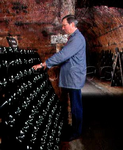 Remueur at work in the cellars of Champagne   LaurentPerrier TourssurMarne Marne France