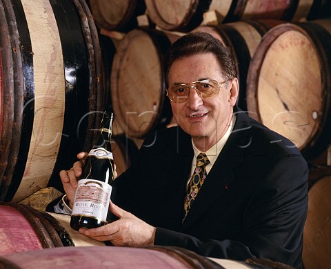 Marcel Guigal with a bottle of his 1995   Cte Rtie La Mouline Ampuis Rhne France