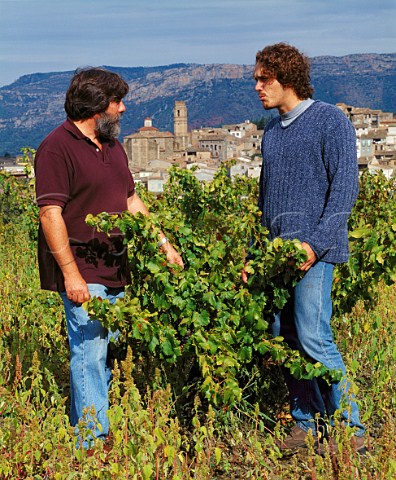 Ren Barbier with his son Ren in a 100year old   Garnacha vineyard which goes to make their   Clos Mogador Gratallops Catalonia Spain  DO Priorato