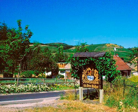 Village sign at Oberhausen with the Steinberg and   Hermannsberg vineyards beyond Germany    Nahe