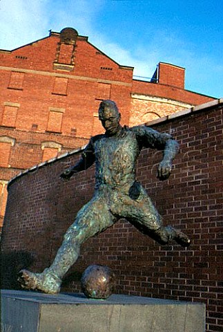 Statue of the famous footballer Jackie   Milburn outside the Scottish and Newcastle brewery Newcastle England