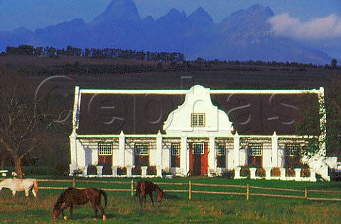 The Cape Dutch homestead of Meerlust   with the Helderberg mountains in   background Stellenbosch South Africa