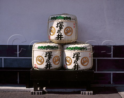 Sake barrels on display outside the Sawanoi Sake  Brewery Sawai Tokyo Japan