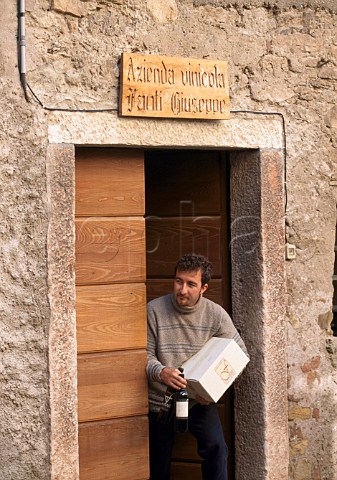 Alessandro Fanti at cellar door of Giuseppe Fanti   winery Lavis Trentino Italy