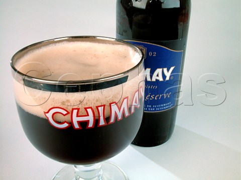 Bottle and glass of Chimay Trappist beer brewed at   Abbaye de NotreDame de Scourmont Forges Belgium   Capsule Bleue 71