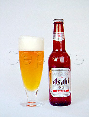 Bottle of Asahi Super Dry beer with glass Japan