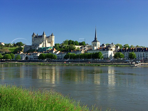 The 14thcentury Chteau de Saumur and spire of St   Pierre church viewed over the River Loire Saumur   MaineetLoire France   AnjouSaumur