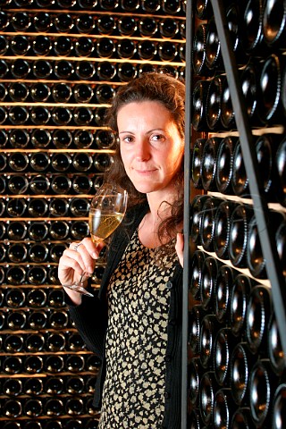 Lucia Barzano in bottle cellar of Il Mosnel winery   Camignone Lombardy Italy   Franciacorta