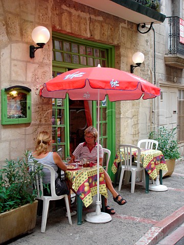Table outside a small restaurant Pzenas Hrault   France LanguedocRoussillon