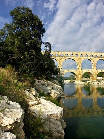 The Pont du Gard a Roman Aqueduct 45m high and 275m   long built to carry the Nmes water supply across   the Gardon River near Remoulins Gard France   LanguedocRoussillon