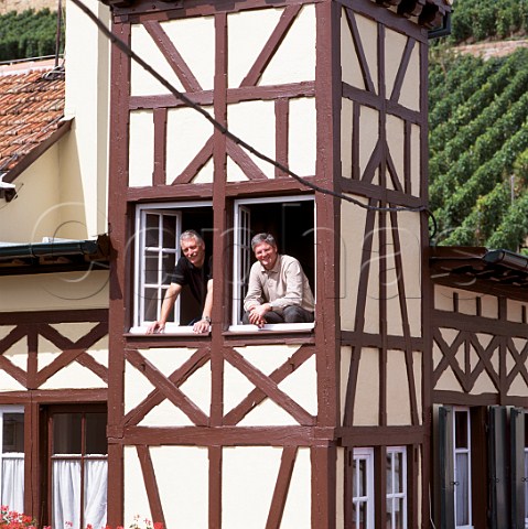Jean and Pierre Trimbach in windows of   Domaine Trimbach Ribeauvill HautRhin France     Alsace