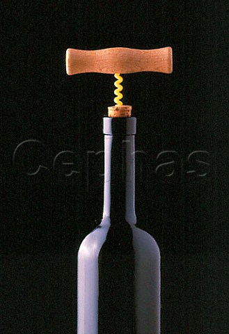 Red wine bottle with corkscrew