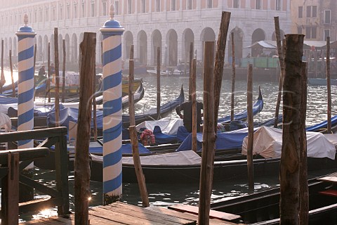 Gondolas moored on the Grand Canal Venice Italy
