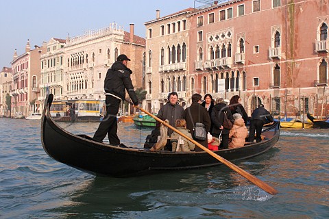 Crossing the Grand Canal by gondola Venice Italy