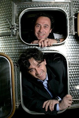 Mario Cordero Vietti top and Luca Currado in tank at the Vietti winery circa 2005 Castiglione Falletto Piemonte   Italy  Barolo