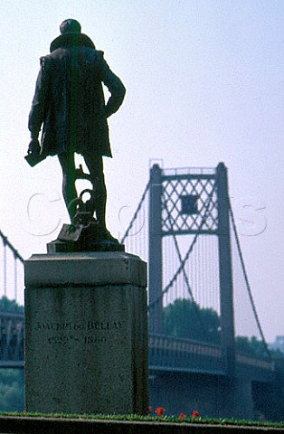 Statue of du Bellay and bridge over the   River Loire Ancenis LoireAtlantique   France