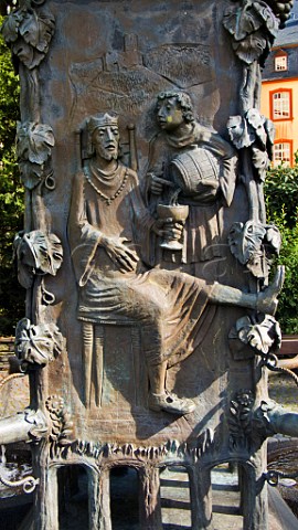 Decorative fountain depicting wine drinking scene   Bernkastel Mosel Germany   Mosel