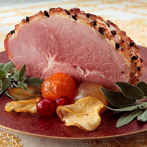 A glazed ham studded with cloves