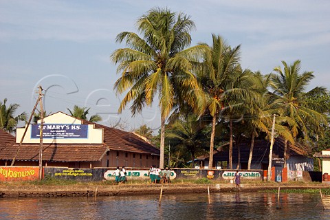St Marys High School on the banks of the Kuttanad the backwaters of Kerala known as the Venice of the East Kerala India